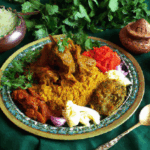 ik-licha-et-imatim-ild-plit-ea-tew-ith-omatoes.png